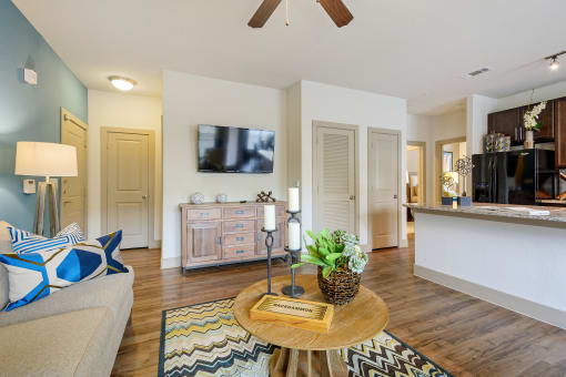 a living room with a couch and a coffee table at Alvista Round Rock, Round Rock, TX