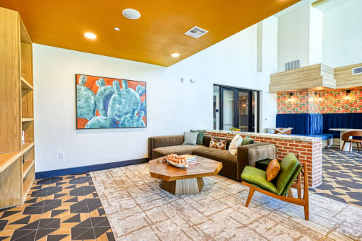 a living room with a couch and a coffee table at Birdie on Woodland Greens, Austin