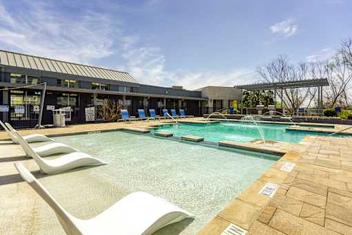 Swimming Pool with lounges at The Landings at Brooks City-Base Apartments , TX, 78235