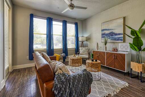 Living room area at The Landings at Brooks City-Base Apartments , San Antonio