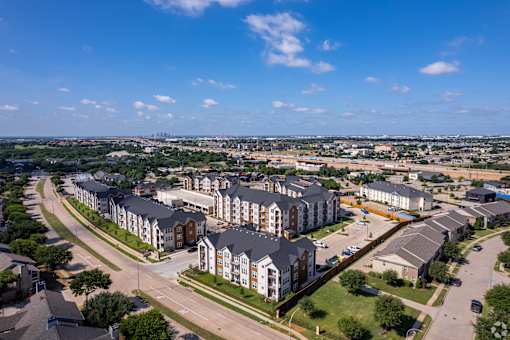 Bird's eye view of a residential area with multiple apartment buildings at Kessler, Texas, 76137