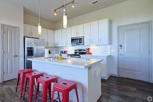 Kitchen with a kitchen islandat Radius on Grove, Austin