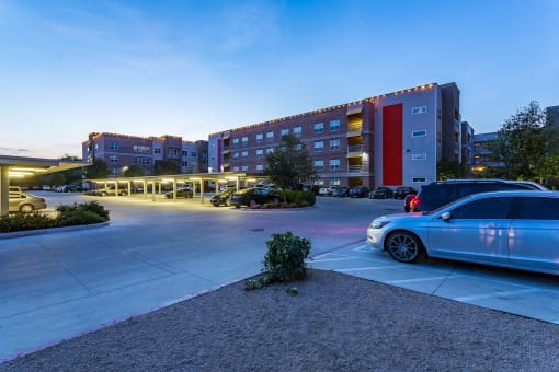 a parking lot with a car parked in front of a building at Republic at Alamo Heights, Texas, 78209