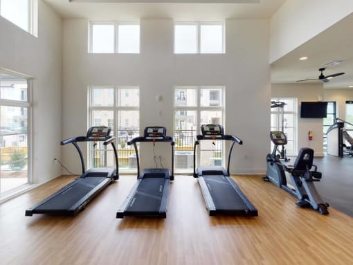 the gym is equipped with cardio equipment including treadmills at The Fitzroy San Marcos, San Marcos