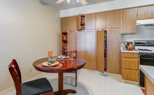 Kitchen area with table and chairs at Carriage Stone