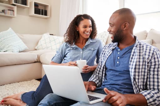 Couple sitting in living room