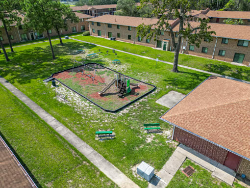 a birds eye view of a playground in a park