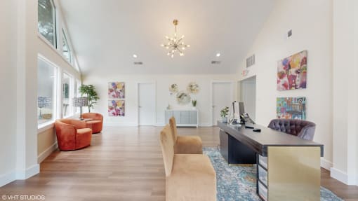 a living room with a desk and a large window at The Vale Apartments and Townhomes, Cordova, 38018
