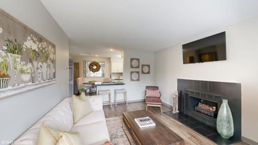 a living room with a couch and a fireplace at Karric Place of Dublin Apartments, Dublin