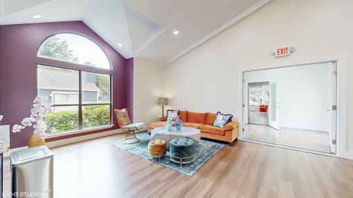 community clubroom with orange couch at The Vale, Cordova, 38018