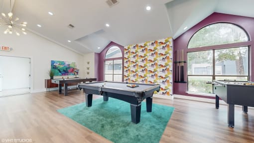 community clubroom with pool table and foosball at The Vale Apartments and Townhomes, Cordova