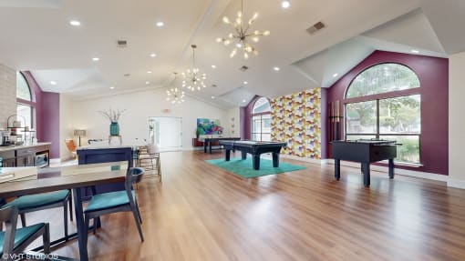 a large living room with a piano and a dining room with tables and chairs at The Vale Apartments and Townhomes, Tennessee