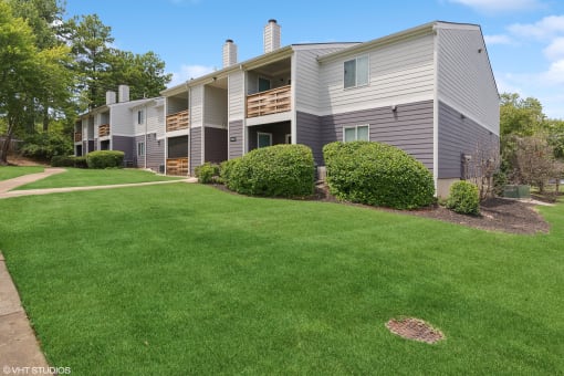 our apartments have a spacious yard with green grass at The Stella, Memphis, TN, 38134