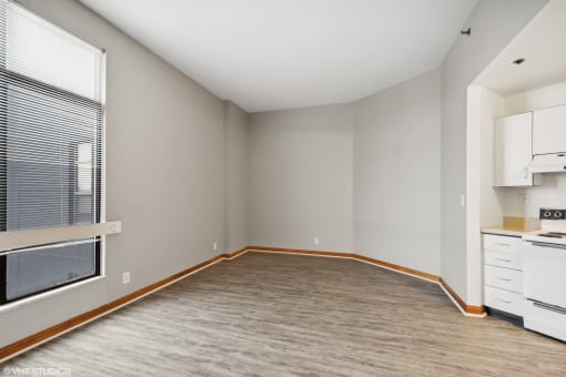 dining room with wood floors and window at Delmar Loop Apartments, Missouri, 63112