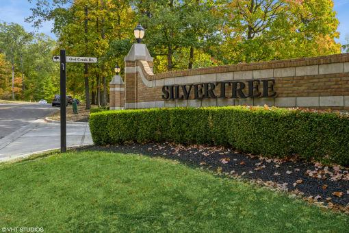 a view of the sign at the side of a brick wall at Silvertree at Little Turtle Apartments, Ohio, 43081