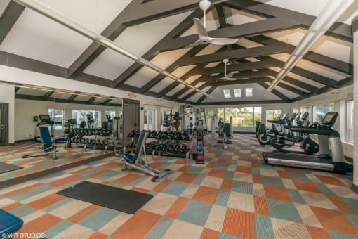 the gym in the clubhouse at the estates at johnsons crossing at Runaway Bay Apartments, Ohio