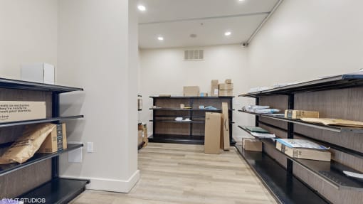 package room and boxes on shelves and boxes piled up on the floor at Bristol On Union Apartment Homes, Memphis, TN