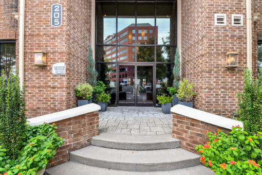 a brick building with a glass door at Bristol On Union Apartment Homes, Memphis, TN, 38104