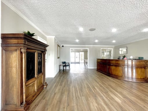 the lobby of a house with a reception desk and at Cambridge Village Apartments, Houston ? 