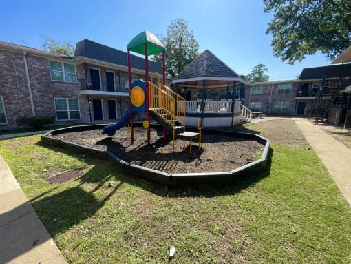 our playground is in front of our building at Tara Oaks in Houston, TX