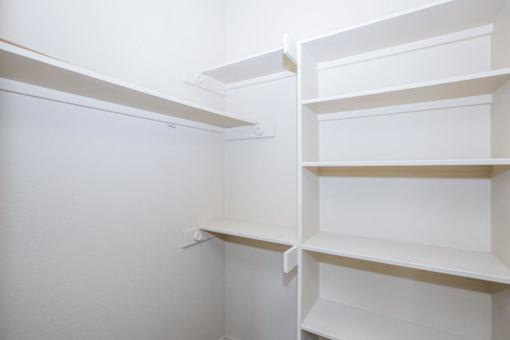 Empty white shelves in a room at Logan Ridge Apartments, San Marcos, TX, 78666