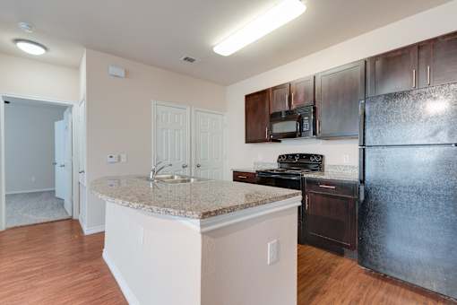 Kitchen with cabinets at Millennium on Post, Texas