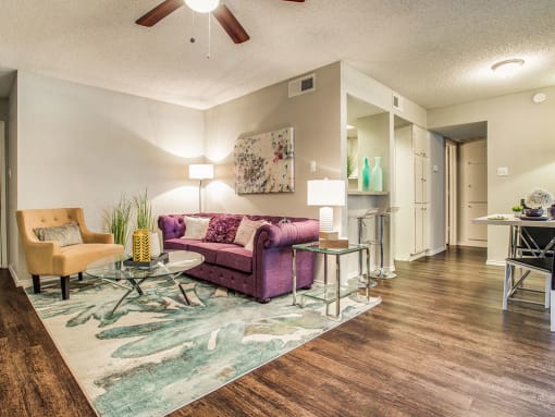 Living Room With Dining Area at Newport Apartments, Irving, TX