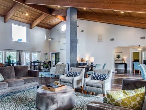 a large room with chairs and tables in it at Water Ridge Apartments, Texas, 75061
