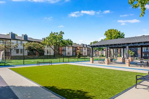 A sunny day at the park with a blue sky and a green lawn at Water Ridge Apartments , Irving, 75061