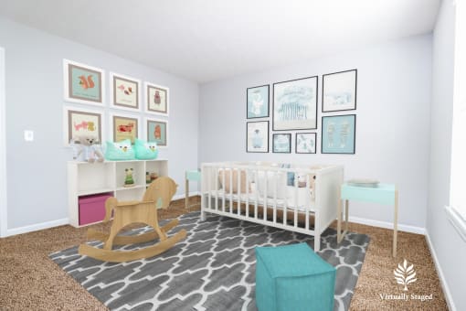a nursery with blue walls and a white crib with a rocking chair and a blue ott