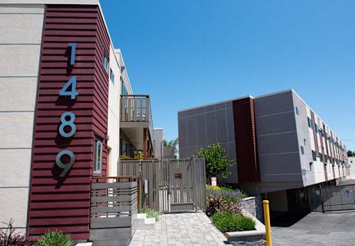 the facade of a building with a sign that reads 388 on it