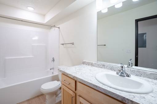 A white bath Cherry Creek Apartments