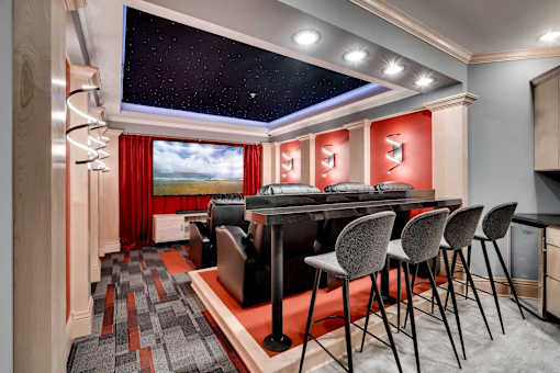 a bar in a room with a table and chairs. Circle Pines, MN Lexington Lofts