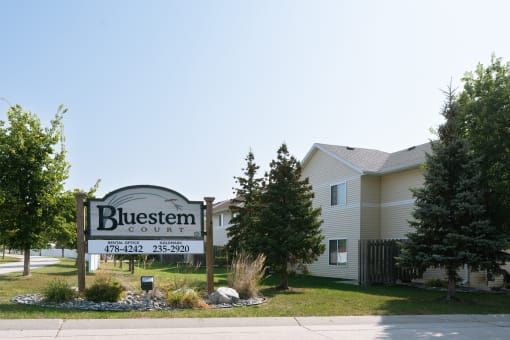 a sign for bluestem court. Fargo, ND Bluestem Townhomes