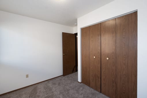 a bedroom with a closet. Fargo, ND Pacific Park 2