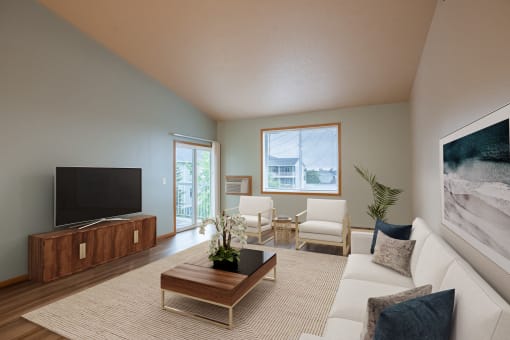 a living room with a couch and a coffee table. Fargo, ND West Lake Apartments