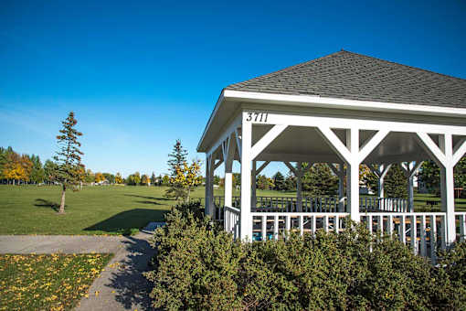A gazebo surrounded by greenery. Fargo, ND Stonebridge Apartments