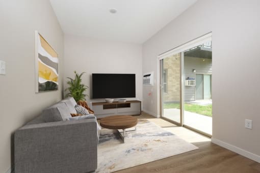 Eagan, MN Glen Pond Addition Apartments | A living room with a couch and a coffee table