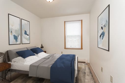 Grand Forks, ND Bristol Park Apartments. a bedroom with a bed and a window