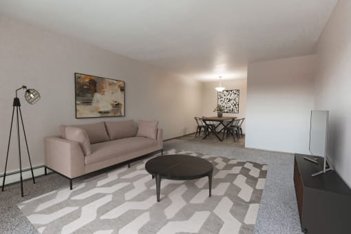 Grand Forks, ND Mayfair Apartments a living room with a couch and a table