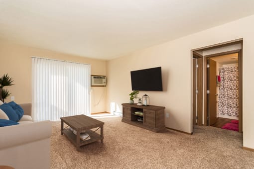 our apartments have a living room with a couch and a coffee table