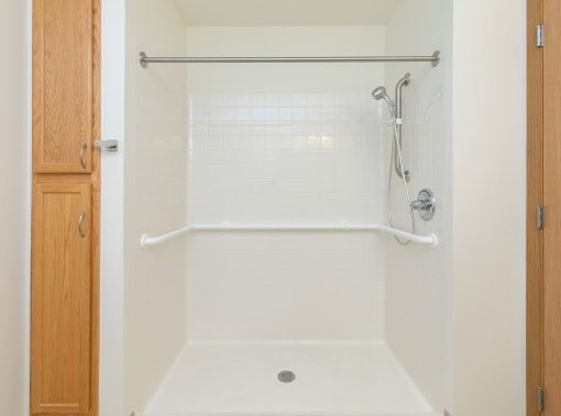 a bathroom with a stand in shower. Fargo, ND Sunrise North