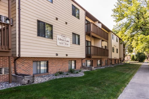Grand Forks, ND Library Lane Apartments exterior with sidewalk