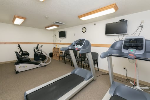 a fitness center with treadmills. Fargo, ND Sunrise North
