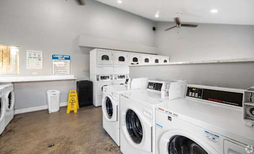Laundry Room at The Oaks Apartments, Upland, CA, 91786