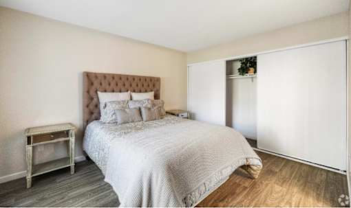 Bedroom With Closet at The Oaks Apartments, Upland, California