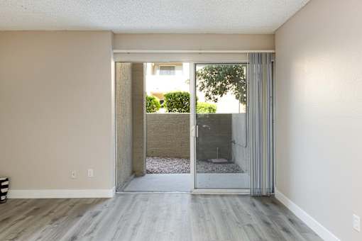 living room with sliding glass doors to an outdoor patio