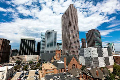 an aerial view of the city with tall buildings and skyscrapers