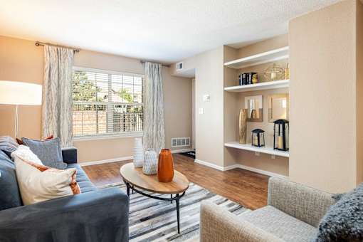 a living room with a couch and a table