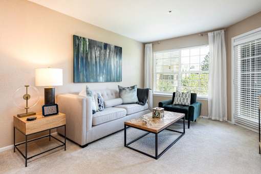 a living room with a couch and a coffee table